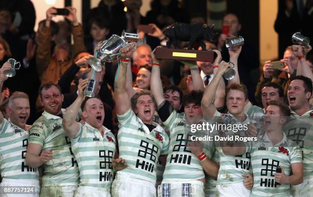 Charlie Amesbury, Captain of Cambridge University lifts the trophy following victory during the Oxford University vs Cambridge University Mens...