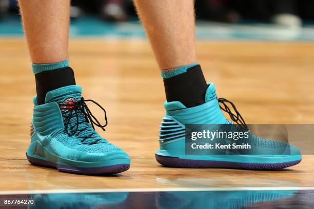 The sneakers of Cody Zeller of the Charlotte Hornets during the game against the Golden State Warriors on December 6, 2017 at Spectrum Center in...