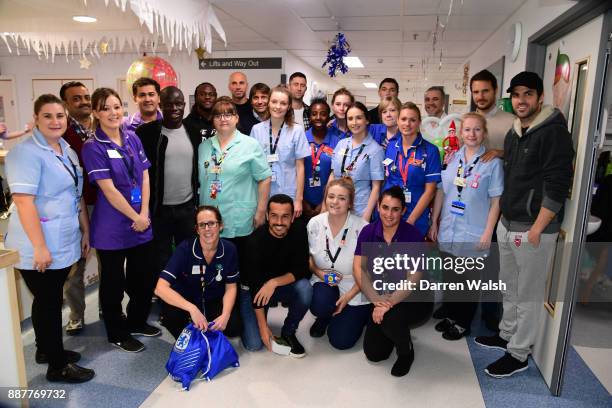 Chelsea Manager Antonio Conte and first team players of Chelsea with the staff of Neptune and Jupiter wards during a visit to the Chelsea and...