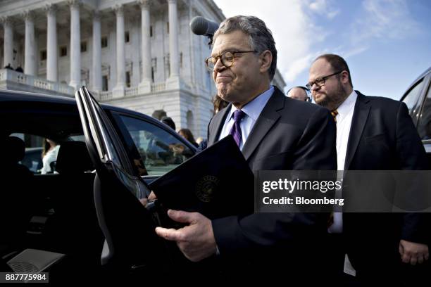 Senator Al Franken, a Democrat from Minnesota, gets into his vehicle after speaking on the Senate floor at the U.S. Capitol in Washington, D.C.,...