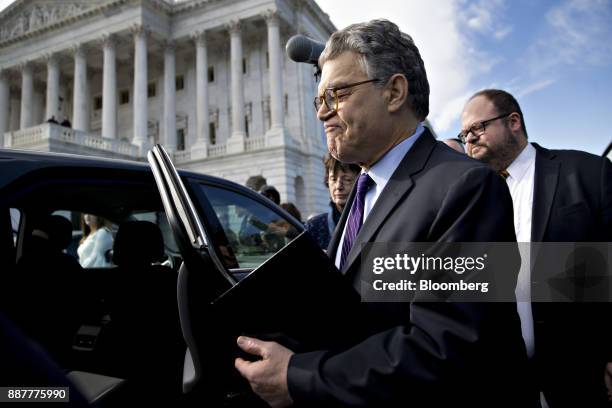 Senator Al Franken, a Democrat from Minnesota, gets into his vehicle after speaking on the Senate floor at the U.S. Capitol in Washington, D.C.,...