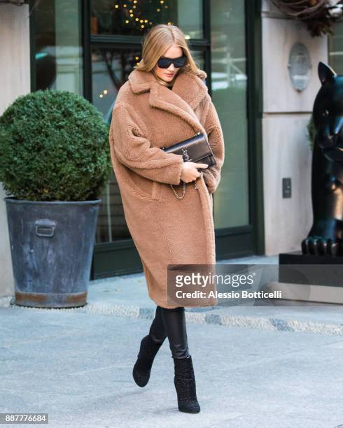 Rosie Huntington-Whiteley is seen leaving her hotel on December 7, 2017 in New York, New York.