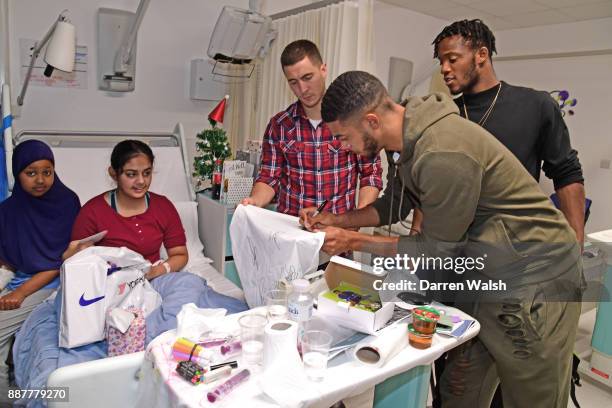 Eden Hazard, Michy Batshuayi and Jake Clarke-Salter of Chelsea at the Chelsea and Westminster Christmas Hospital visit on December 7, 2017 in London,...