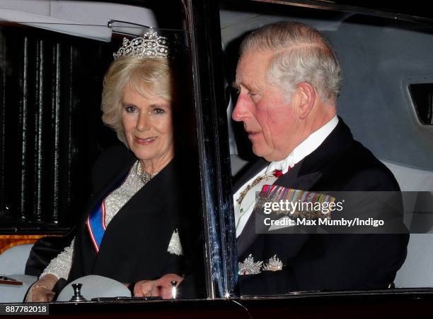 Camilla, Duchess of Cornwall and Prince Charles, Prince of Wales depart after attending the annual Diplomatic Reception at Buckingham Palace on...