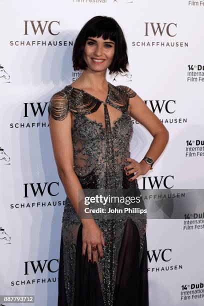 Tuba Buyukustun attends the sixth IWC Filmmaker Award gala dinner at the 14th Dubai International Film Festival , during which Swiss luxury watch...