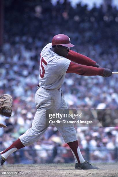 Thirdbaseman Richie Allen of the Philadelphia Phillies swings at a pitch during a game in 1964 against the Cincinnati Reds at Crosley Field in...