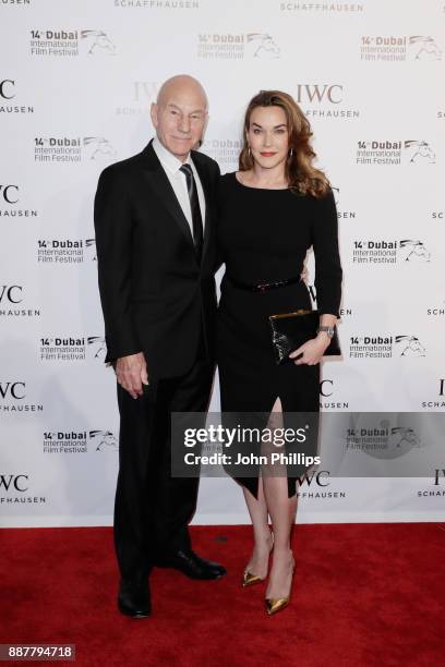 Sir Patrick Stewart and Sunny Ozell attend the sixth IWC Filmmaker Award gala dinner at the 14th Dubai International Film Festival , during which...