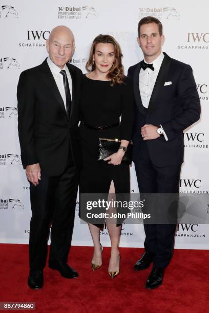 Sir Patrick Stewart, Sunny Ozell and IWC Schaffhausen CEO Christoph Grainger-Herr attend the sixth IWC Filmmaker Award gala dinner at the 14th Dubai...