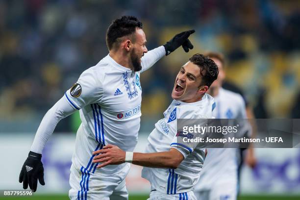 Junior Moraes of FC Dynamo Kyiv celebrates his second goal with Mykola Morozyuk of FC Dynamo Kyiv during the UEFA Europa League group B match between...