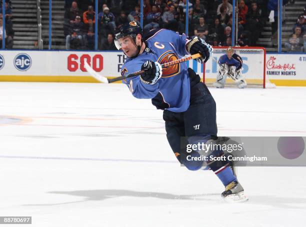 Ilya Kovalchuk of the Atlanta Thrashers fires a shot against the Buffalo Sabres at Philips Arena on April 1, 2009 in Atlanta, Georgia.