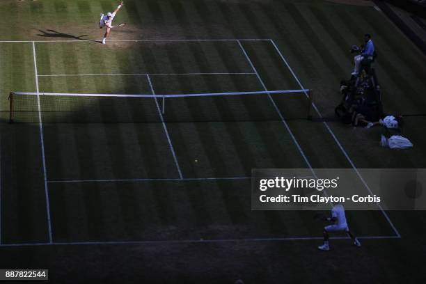 Andy Murray of Great Britain in action against Fabio Fognini of Italy on Centre Court in the Gentlemen's Singles competition during the Wimbledon...