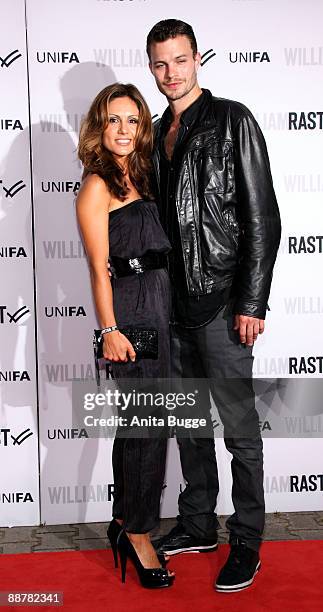 Nazan Eckes and boyfriend Julian Khol arrives to the "William Rast" fashion show during the Bread and Butter fashion trade fair at the Silver Wings...