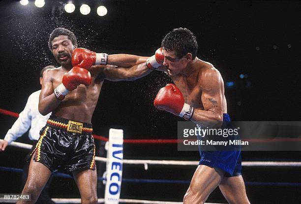 World Light Welterweight Title: Alexis Arguello in action, throwing punch vs Aaron Pryor during match at Orange Bowl Stadium. Miami, FL CREDIT: Manny...