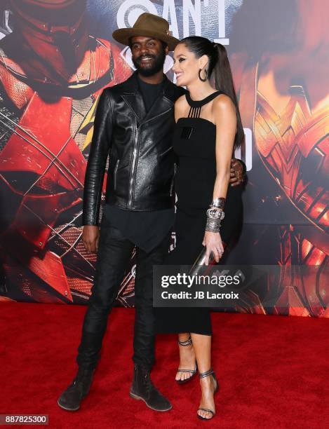 Gary Clark Jr. And Nicole Trunfio attend the premiere of Warner Bros. Pictures' 'Justice League' on November 13, 2017 in Los Angeles, California.