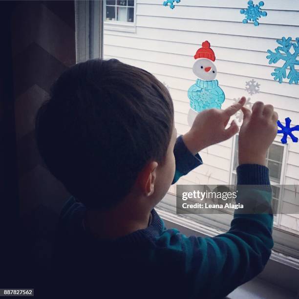 window decorating - leana alagia stock pictures, royalty-free photos & images