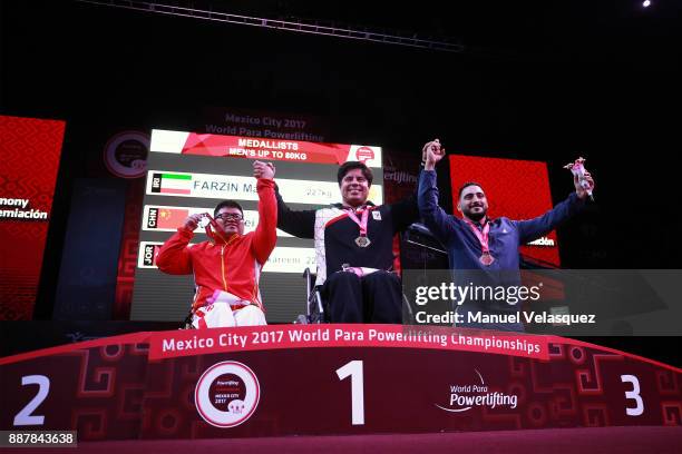 Xiaofei Gu of China , Majid Farzin of Iran and Abdelkar Khattab of Jordan pose during the Men's Up to 80Kg Group A Category as part of the World Para...