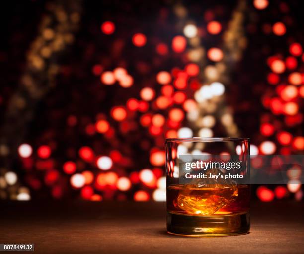 whisky in city background - scotch whisky stock-fotos und bilder