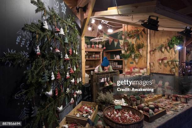 Stall holders wait for customers at the Vorosmarty Square Christmas market on December 7, 2017 in Budapest, Hungary. The traditional Christmas market...