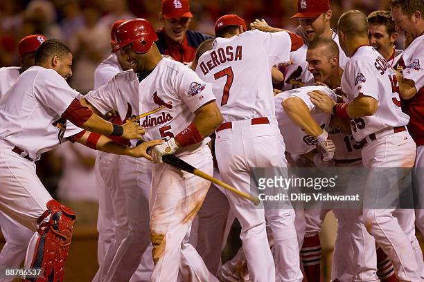 Members of the St. Louis Cardinals celebrate Colby Rasmus' walk-off home run against the San Francisco Giants on July 1, 2009 at Busch Stadium in St....