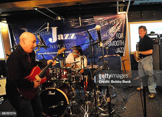 Spyro Gyra members Julio Fernandez, Bonny B and Jay Beckenstein perform during the 2009 Smooth Cruises aboard the Spirit Of New York Cruise Ship on...