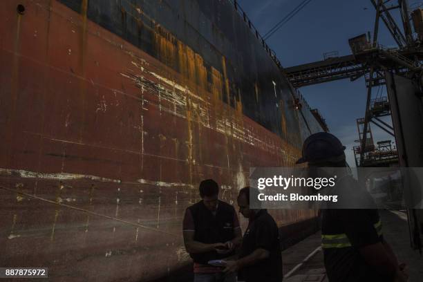 Federal customs agent checks documents at the Port of Santos in Santos, Brazil, on Thursday, Oct. 5, 2017. The port complex is a 3-square-mile...