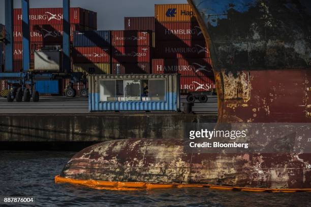 Shipping containers sit stacked at the Port of Santos in Santos, Brazil, on Wednesday, Oct. 4, 2017. The port complex is a 3-square-mile microcosm of...
