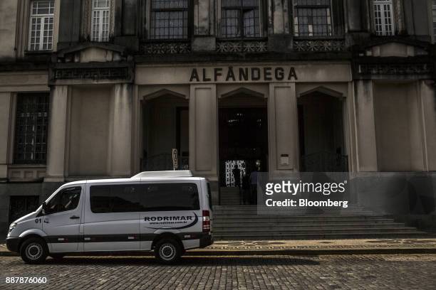 Van sits parked outside a customs office at the Port of Santos in Santos, Brazil, on Thursday, Oct. 5, 2017. The port complex is a 3-square-mile...
