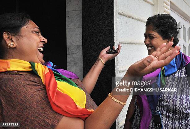 Members of the Indian homosexual community celebrate the New Delhi High Court ruling decriminalising gay sex, in Bangalore on July 2, 2009. A top...