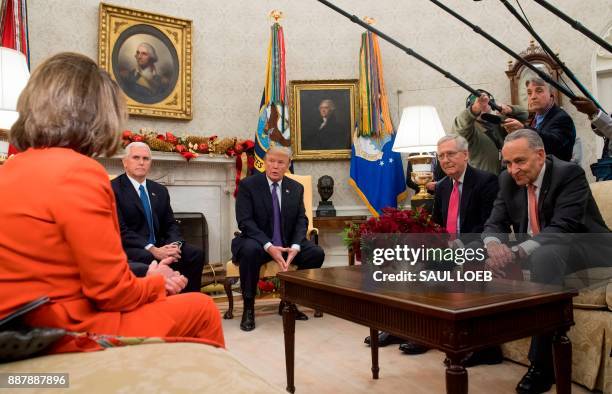 President Donald Trump, alongside Vice President Mike Pence , meets with Congressional leadership including Senate Majority Leader Mitch McConnell ,...