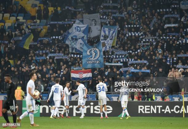 Dynamo's players react after the UEFA Europa League group stage football match between Dynamo Kyiv and FK Partizan in Kiev on December 7, 2017. D /...