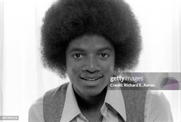 Michael Jackson poses for a portrait during an interview in a hotel room in New York in 1977.