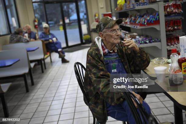 Gordon Pigg gathers with his friends at their morning breakfast spot in the Nesmith Exxon store where they eat and discuss daily events on December...