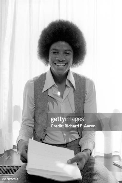 Michael Jackson poses for a portrait during an interview in a hotel room in New York in 1977.