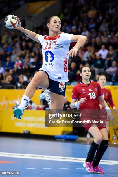 Camilla Herrem of Norway tries to score a goal during IHF Women's Handball World Championship group B match between Czech Republic and Norway on...