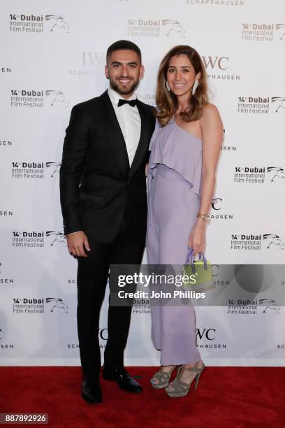 Elias El Indari and Lea Yassine attend the sixth IWC Filmmaker Award gala dinner at the 14th Dubai International Film Festival , during which Swiss...