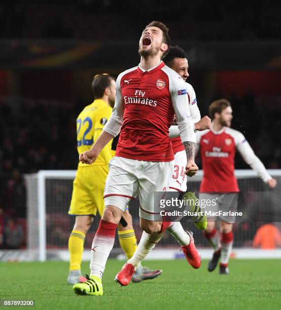 Mathieu Debuchy celebrates scoring for Arsenal during the UEFA Europa League group H match between Arsenal FC and BATE Borisov at Emirates Stadium on...