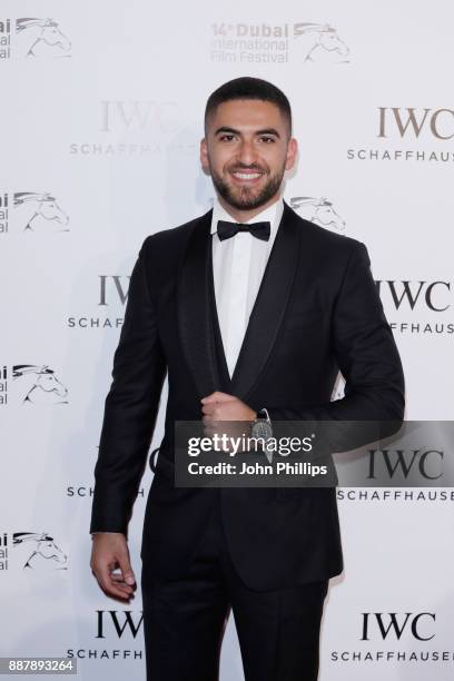 Elias El Indari attends the sixth IWC Filmmaker Award gala dinner at the 14th Dubai International Film Festival , during which Swiss luxury watch...