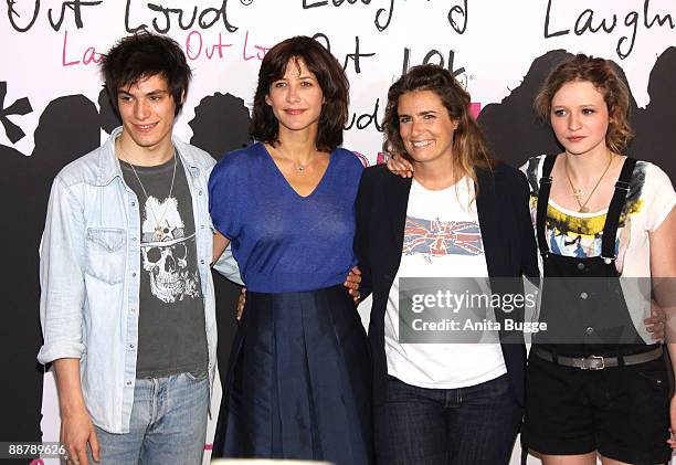 Actor Jeremy Kapone, actress Sophie Marceau, director Lisa Azuelos and actress Christa Theret attend a photocall for the new French film "LOL" on...