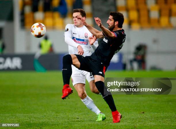 Athletic Bilbao's Raul Garcia fights for the ball with Zorya's Oleksandr Andriyevskiy during the UEFA Europa League Group J football match between...