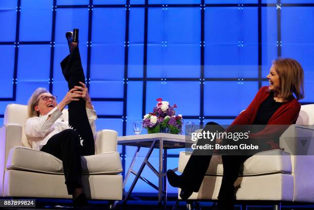 Meryl Streep, left, reacts as she and Gloria Steinem speak during the Keynote Luncheon at The Massachusetts Conference For Women at the Boston...