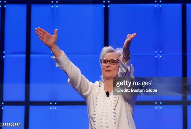Meryl Streep gestures to the crowd after speaking during the Keynote Luncheon at The Massachusetts Conference For Women at the Boston Convention and...