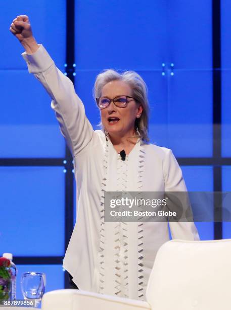 Meryl Streep gestures to the crowd after speaking during the Keynote Luncheon at The Massachusetts Conference For Women at the Boston Convention and...