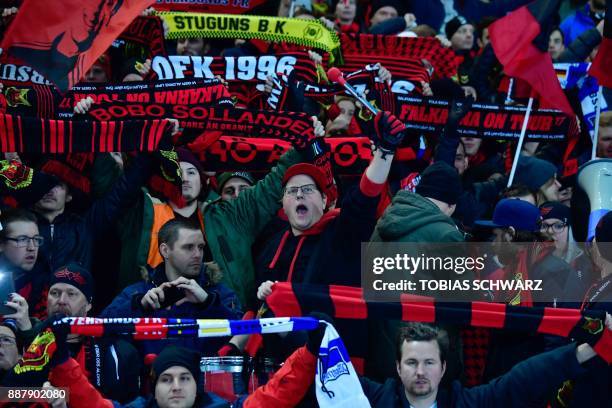 Supporters of Ostersund cheer their team prior to the UEFA Europa League group J football match Hertha BSC Berlin vs Ostersund FK on December 7, 2017...