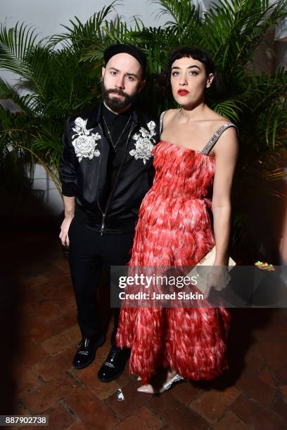 Yoann Lemoine and Mia Moretti attend Artsy Projects Miami VIP at The Bath Club on December 6, 2017 in Miami Beach, Florida.