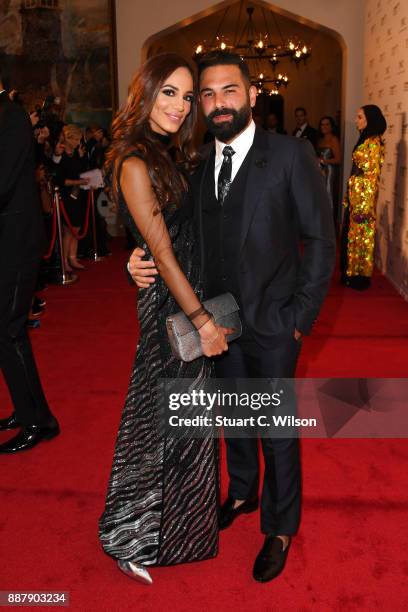 Zeynab El-helw and designer Muhammad Kenzo attend the sixth IWC Filmmaker Award gala dinner at the 14th Dubai International Film Festival , during...