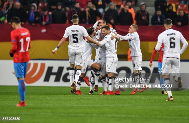 Energy Investment Lugano's players celebrates after Fabio Daprela scored the 0-1 against of Steaua Bucharest during the UEFA Europa League group G...