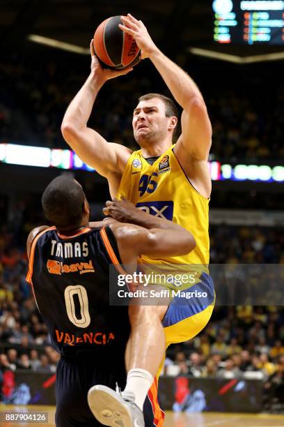 Artsiom Parakhouski, #45 of Maccabi Fox Tel Aviv competes with Will Thomas, #0 of Valencia Basket during the 2017/2018 Turkish Airlines EuroLeague...