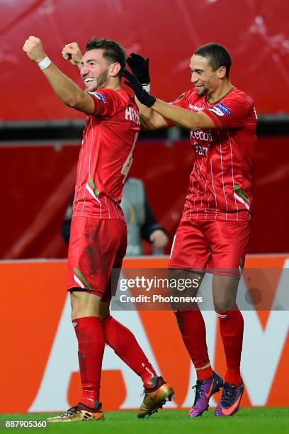 Michael Heylen defender of SV Zulte Waregem celebrates scoring a goal with teammates Nill De Pauw midfielder of SV Zulte Waregem during the UEFA...