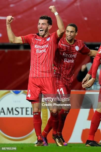 Michael Heylen defender of SV Zulte Waregem celebrates scoring a goal with teammates Nill De Pauw midfielder of SV Zulte Waregem during the UEFA...