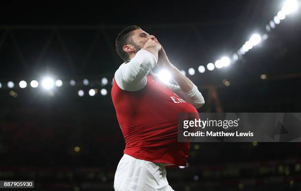 Olivier Giroud of Arsenal celebrates after scoring his teams fifth goal of the game from the penalty spot during the UEFA Europa League group H match...
